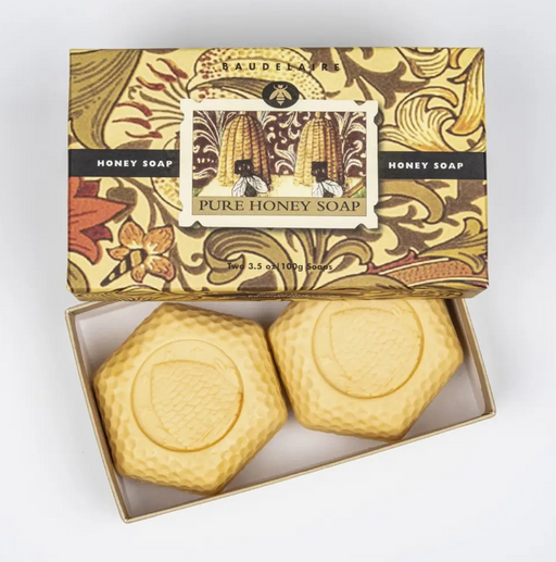 Two hexagonal honey-shaped soaps in a decorative box with Baudelaire branding.