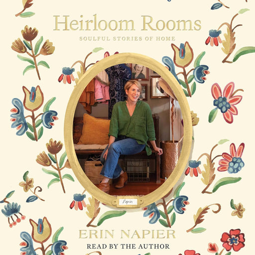 Book cover of 'Heirloom Rooms' with a woman sitting in a room and floral patterns.