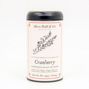 A signature tea tin labeled 'Cranberry' by Oliver Pluff & Co. containing 20 teabags with a black lid on a white background.