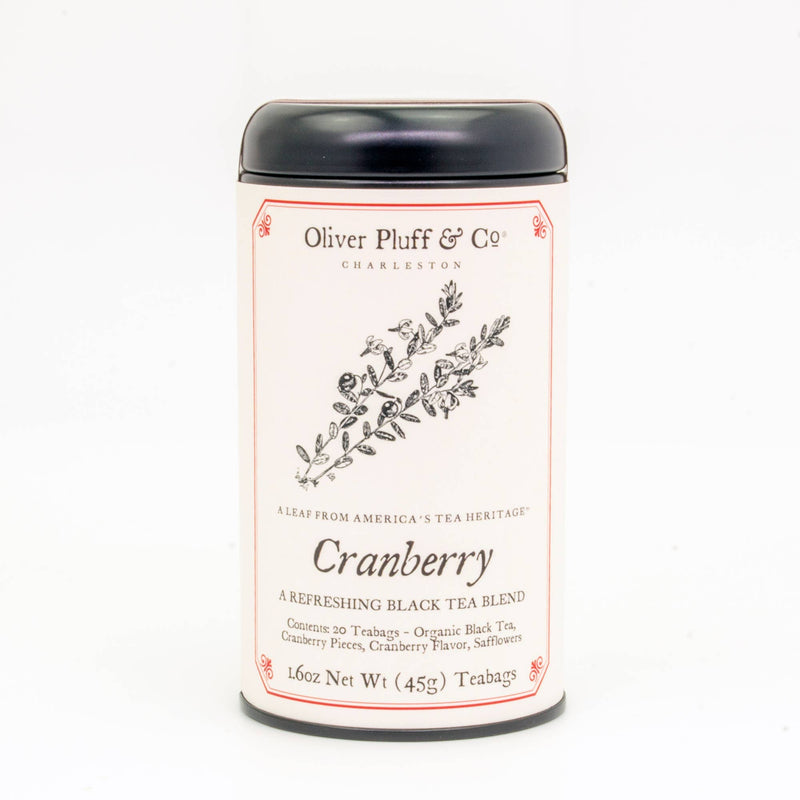 A signature tea tin labeled 'Cranberry' by Oliver Pluff & Co. containing 20 teabags with a black lid on a white background.