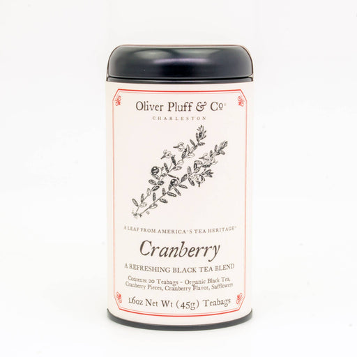 A signature tea tin labeled 'Cranberry' by Oliver Pluff & Co. containing 20 teabags with a black lid on a white background.