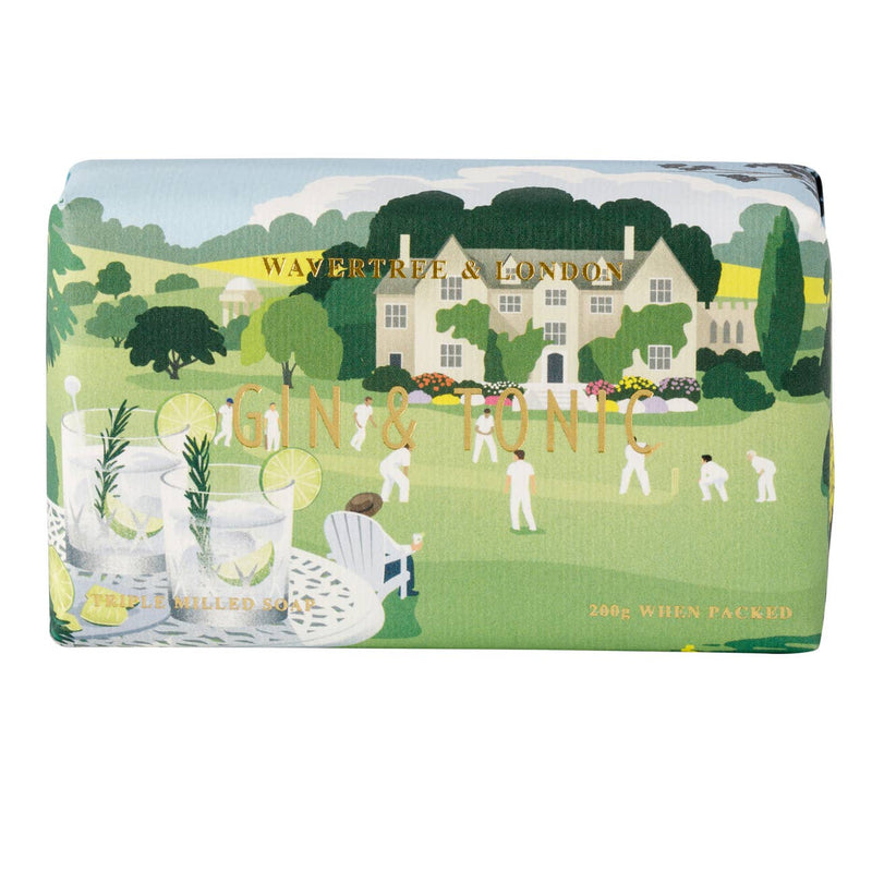 A packaged luxury soap bar with an illustration of a manor house and a scene with people playing cricket, titled 'Gin & Tonic'.