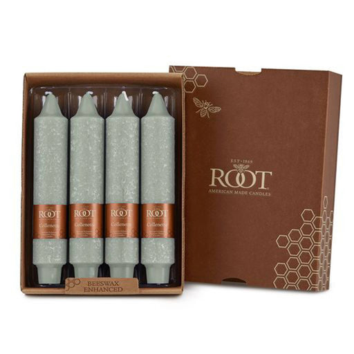 Set of four candles in a box with Root brand logo on a white background
