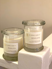 white candle in glass jar balsam citrus made in new england